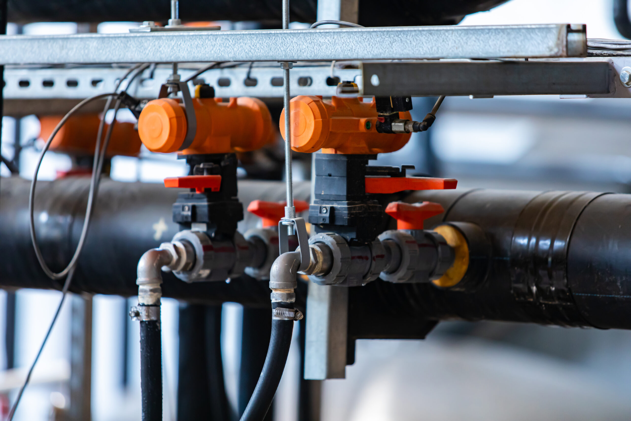 brewery piping system logistics brewery piping systems logistical unit rack connected to PVC piping for structural purposes in an industrial beer brewery